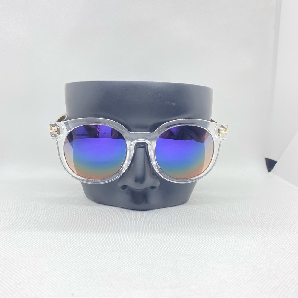Clear round frame sunglasses. Round lenses. Reflective finish.